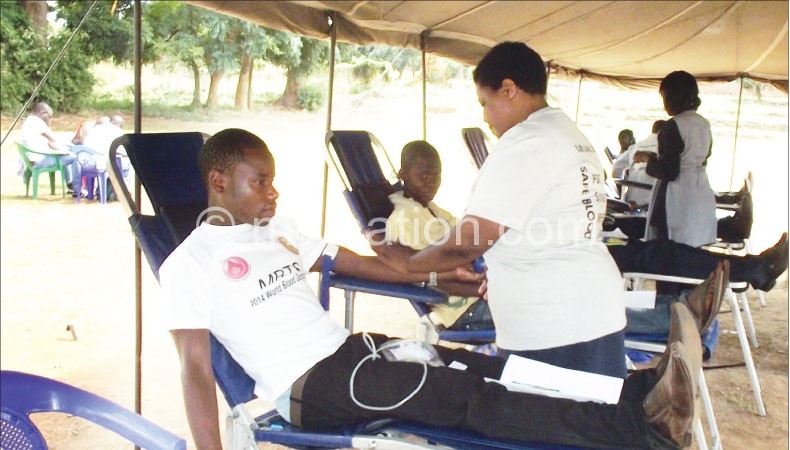 People donate blood during the function