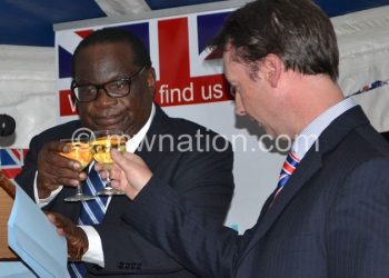 British enoy to Malawi Nevin (R) and Goodall Gondwe