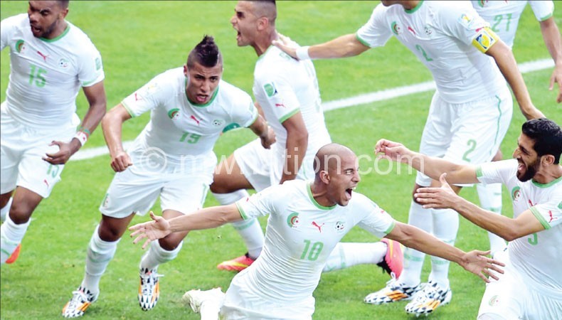 Jubilant Algerian players celebrate win against South Korea on Sunday