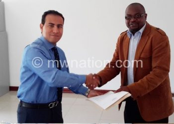 Kasunda (right) presents petition to the egyptian Ambassodor to Malawi Mouhahad El-Ashmawy
