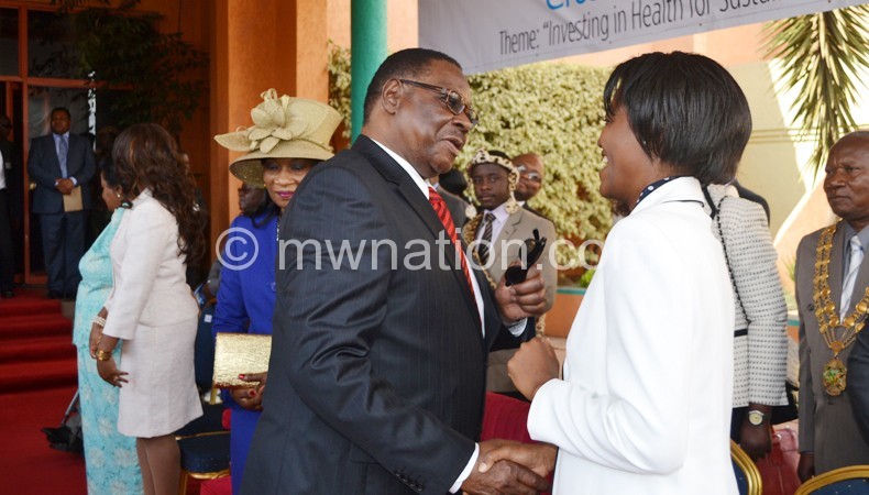 Mutharika with Chairperson for the Parliamentary Committee on Health Julliana Lunguzi