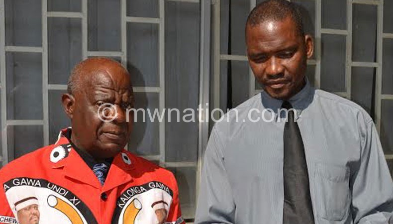 Chefo officials Kenneth Nseka (L) and Sefren Khumula emphaising a point