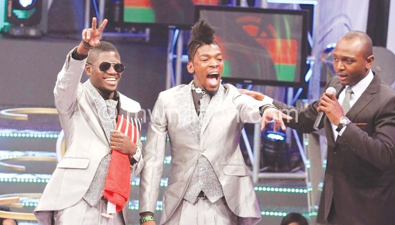 Wati (R) and Nafe wearing designers suits the Big Brother Africa show