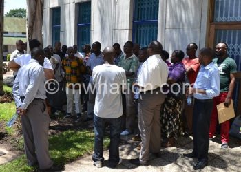 Blantyre ACB staff getting an update after their offices were sealed on Tuesday