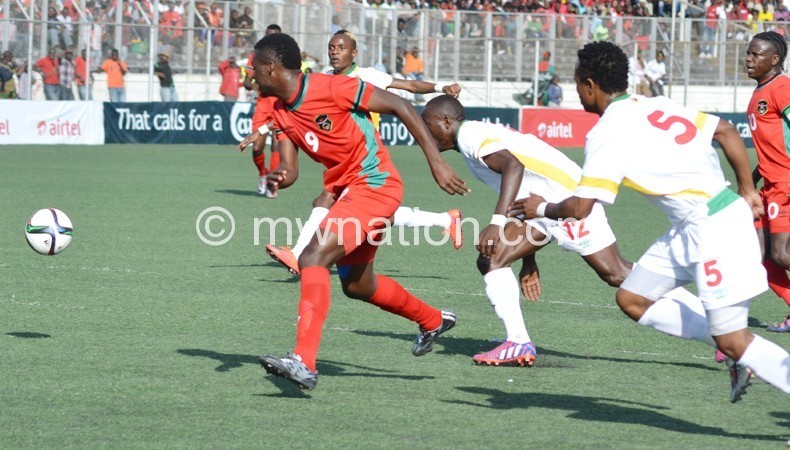 Flames (in red) in action against Zimbabwe in a 2017 Afcon qualifier last month