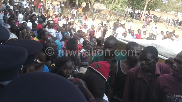 Concerned citizens block the entrance to the Karonga Magistrate’s Court