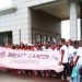 Well-wishers and activists get started on a march to raise
awareness of breast cancer