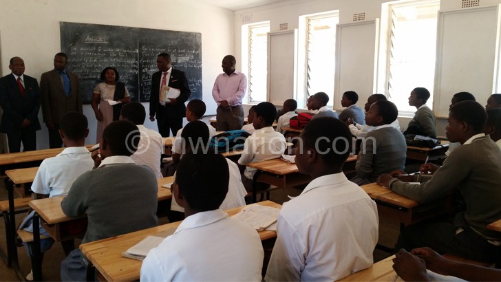 Officials inspecting desks at Soche Hill Secondary School in Blantyre