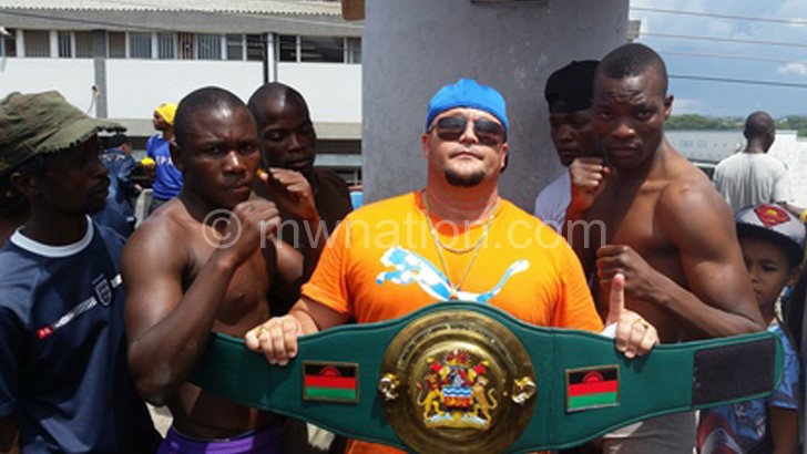 Rousseau poses with the boxers after wiegh-in
