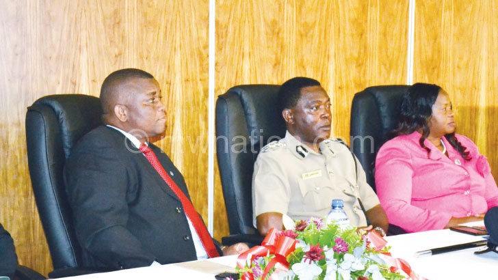 Chigwenembe (L) and Banda (C) during the meeting