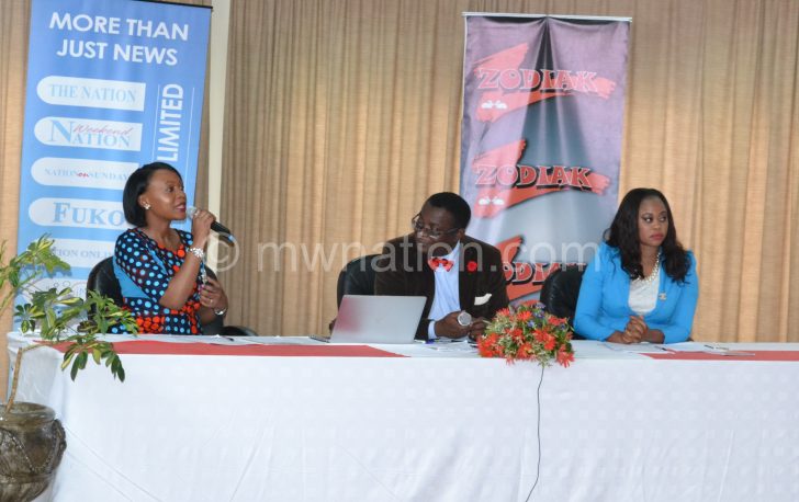 One of the judges Blandina (L) stresses a point as fellow judges Mijiga (C) and Chihana pay close attention