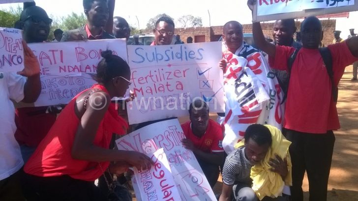 Zomba  marchers are seen with their placards