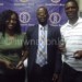 CDHIB director Kingsley Zulu (C) poses with Kambale (L) and Mwakhwawa
