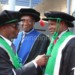 Vice Chancellor of Lilongwe University of Agriculture and Natural Resources Prof.George Yobe Kanyama Phiri (R) interacts with other Proffessors after the graduation (C)Stanley Makuti