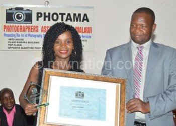 Chikondi gets her award from Ndipo