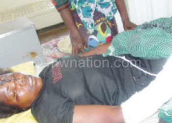 GBV survivor Taludi Chipatula in hospital after being hacked by her husband in Ntchisi