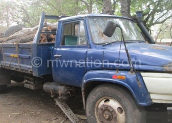 Park officials impounded the above truck which was carrying the logs