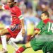 Former Flames captain John Maduka (L) in action 
against Morocco in 2005