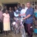 Some of the beneficiaries receiving the bicycle