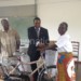 One of the educators receiving 
a bicycle