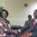 Mwanakatwe (L)  exchanges MoU documents with Mwanamvekha