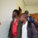 Wandale (L) making his way out of the court
after a hearing on Tuesday