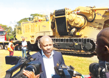 A Khato Civils official briefs journalists on arrival of advance equipment