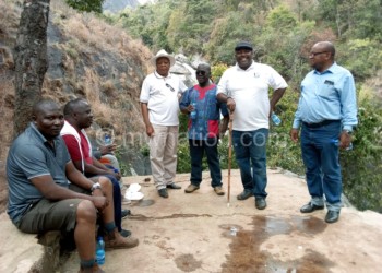 Parliamentary committee members on 
the site where water will be tapped