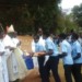 Bishop Tambala blesses the offering  during the Eucharist Mass