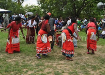 At times, Malawian women dance to songs that belittle them