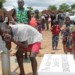 A pupil ‘tastes’ water at the new borehole
