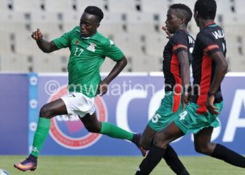 Malawi (in black) facing Zambia at 2017 Under-20 Cosafa Championship
