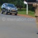 Katunga directs traffic on one of the roads in Lilongwe