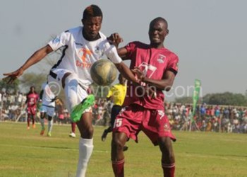 A Super League match in action at one of the venues Karonga Stadium