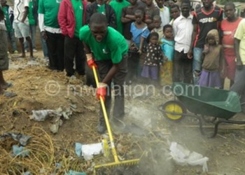 Mbanira Market vendors cleaning the market