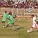 Mponela (in green) battling it out against Big Bullets in Super League