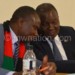 Nungu (L) confers with Dausi during 
the meeting