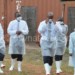 Muluzi (2nd L) inspects a cholera camp during the outbreak