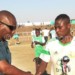 Masoatheka (R) receiving his SPA Man-of-the-Match trophy from Sulom’s Aggrey Khonje