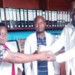 Chindiwo (L) hands over the drugs to Kaunda