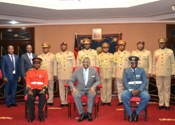 Mutharika poses with Salimu (seated L), Nkhoma (seated R) and MDF senior officers