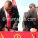 Chilima and Chakwera sign the pact in this file photo