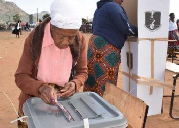 A woman votes in a past election