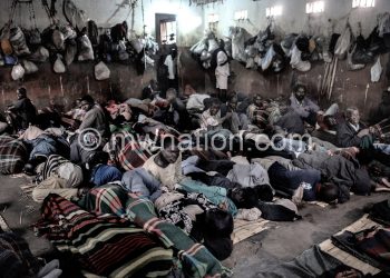 Inmates sit all night-long in overcrowded Cell Five at Chichiri, struggling to sleep