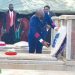 Flashback: Mtambo lays a wreath at the grave of one
of the July 20 victims