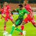 Bullets defender Sankhani Mkandawire (R) chasing a Young Africans player during the first game