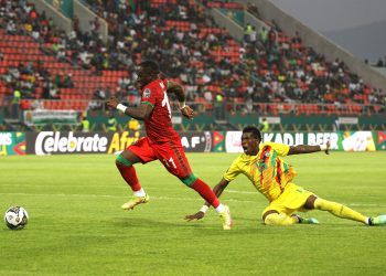 Mhango (R) scores the second goal for Flames