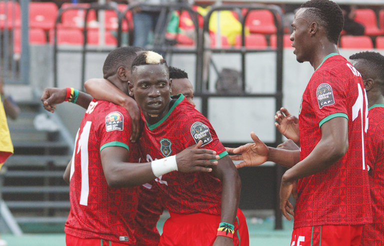 Flames celebrate one of their goals against Zimbabwe
