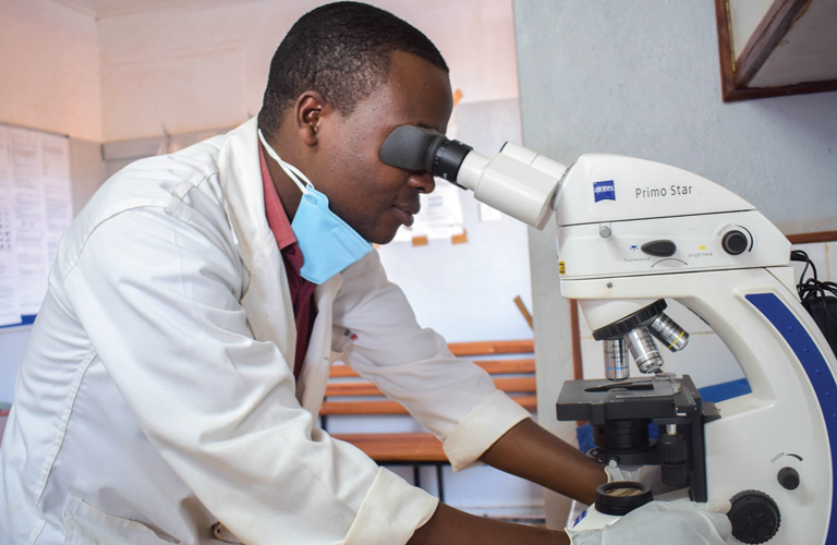 Clinician carries out TB testing at a health centre in Lilongwe