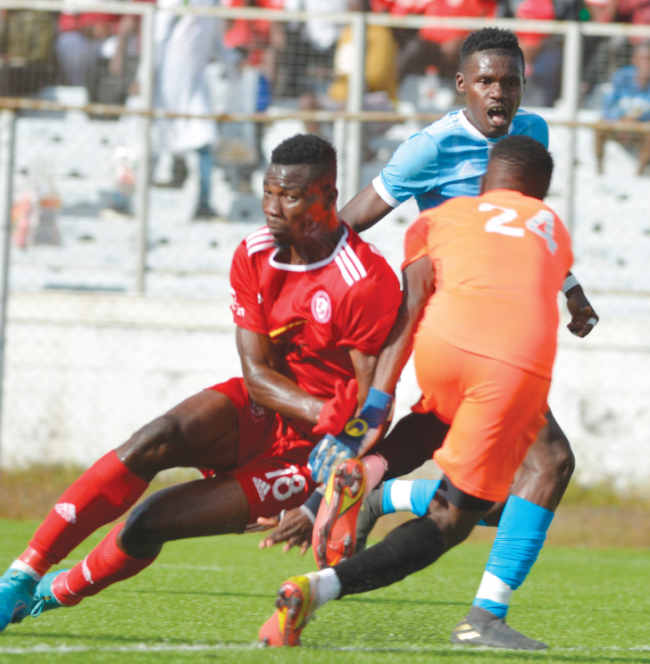Babatunde (L) captured in the thick of action against Silver